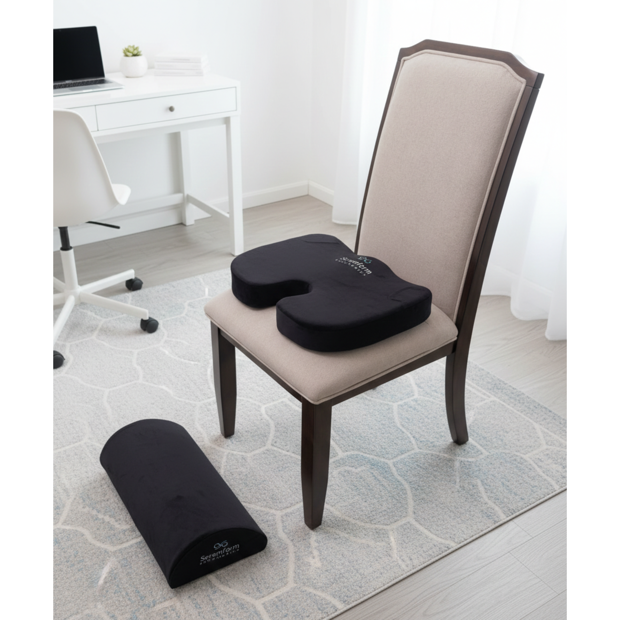 Lumbar support pillow and ergonomic seat cushion shown on a chair in a home office, promoting better posture and long-lasting sitting comfort