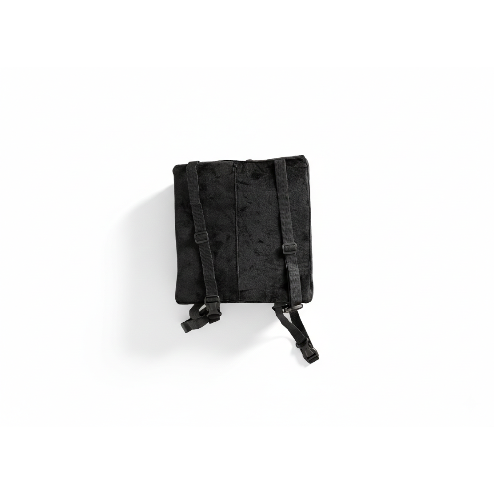 Rear end of lumbar support pillow on a white background