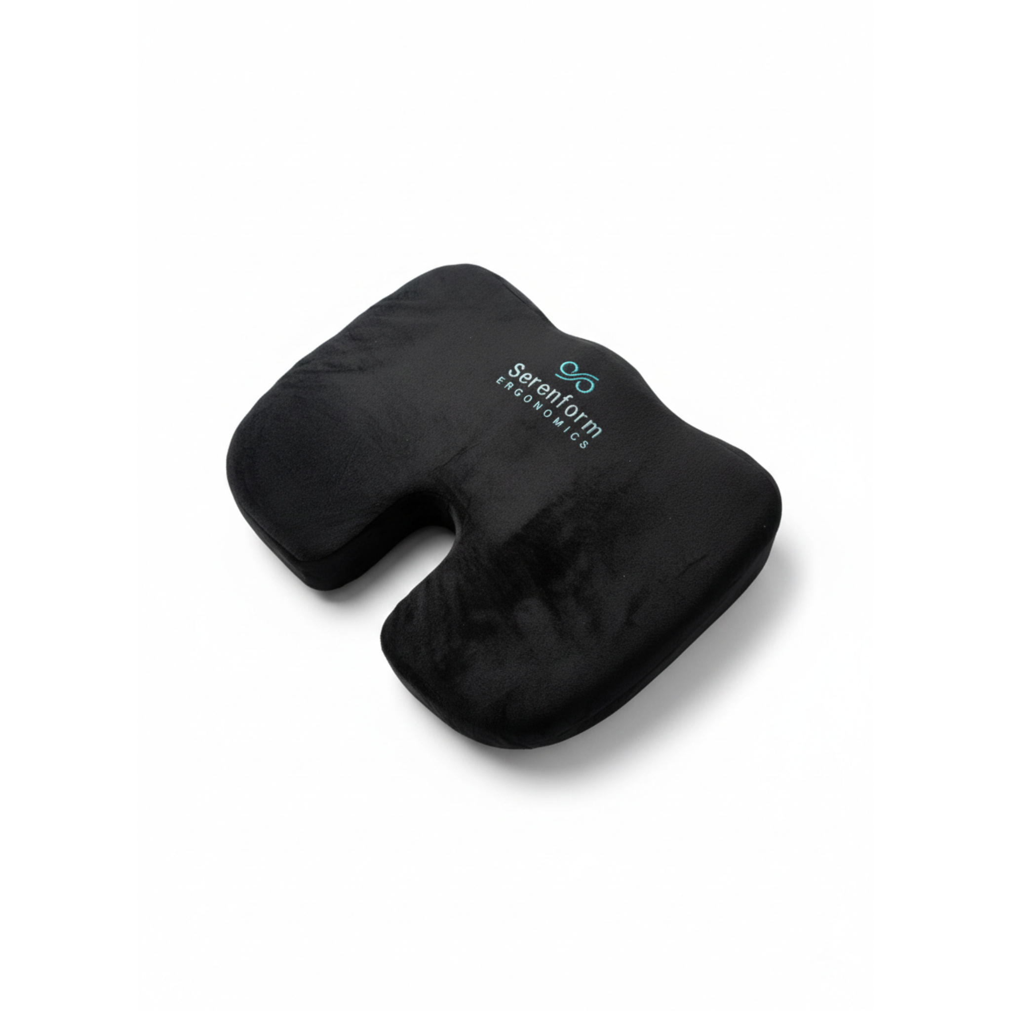 Black ergonomic pillow with 'Serenform Ergonomics' branding on a white background